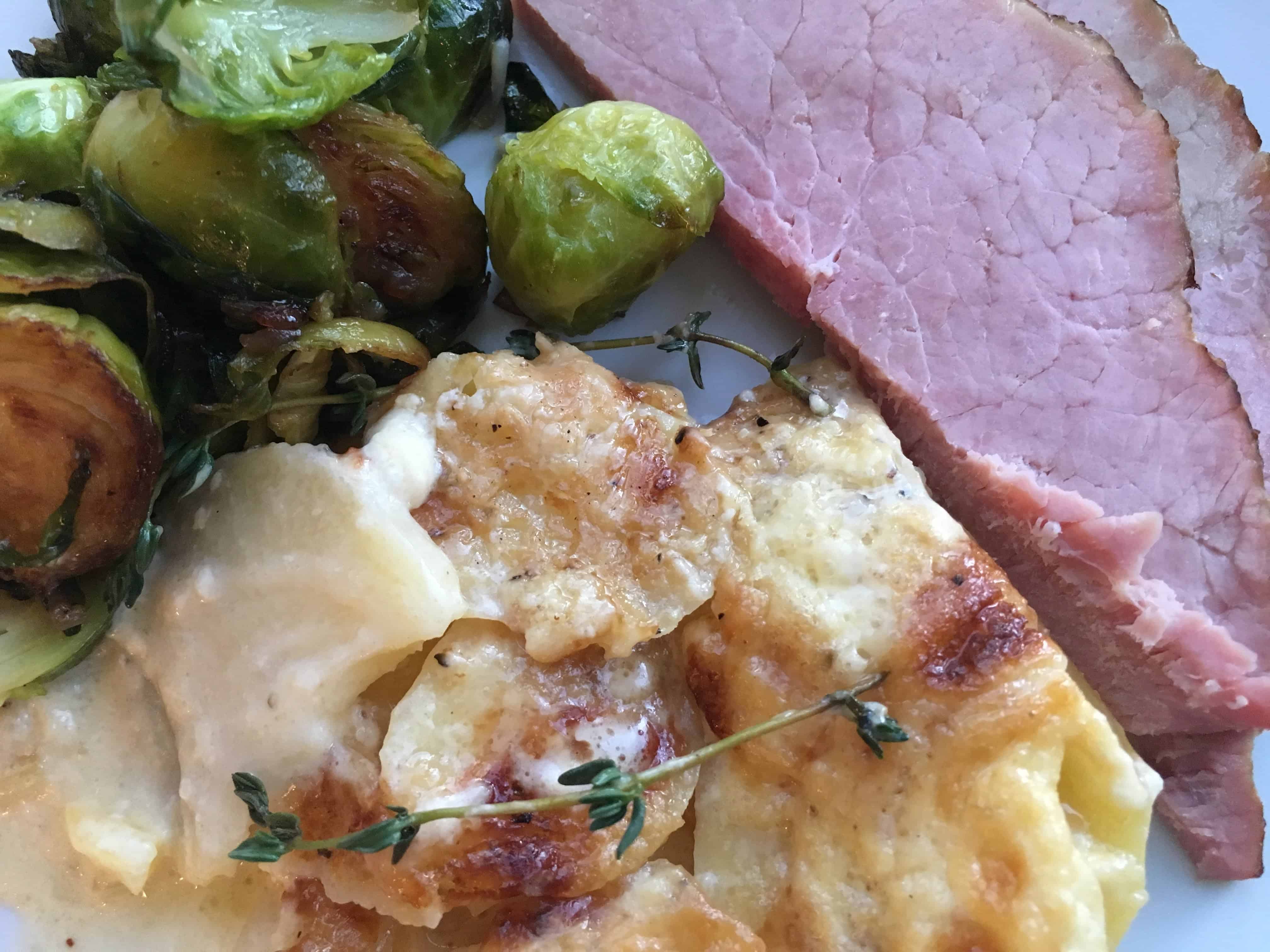 Potatoes Au Gratin with ham and brussels sprouts