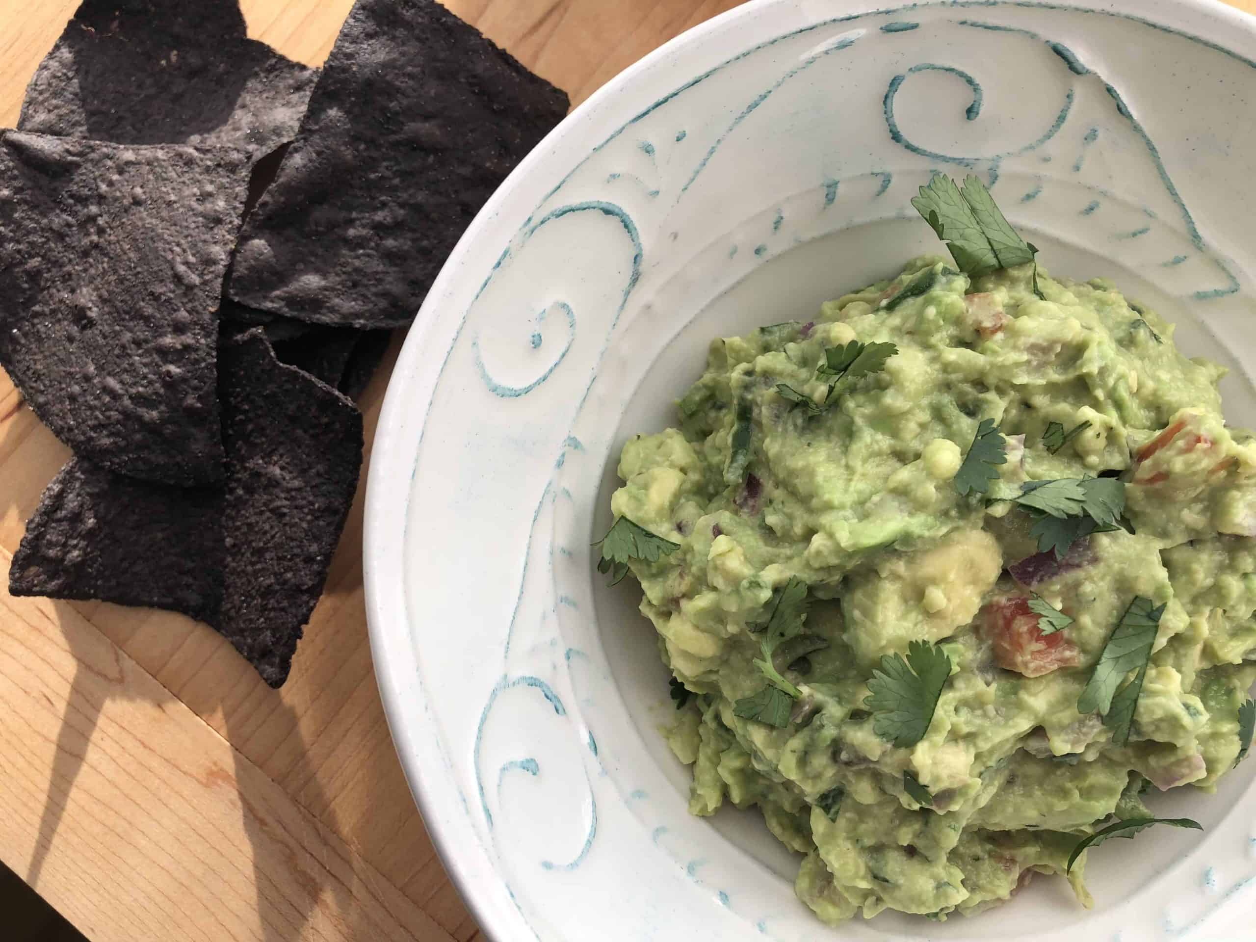 top down shot of Easy Homemade Guacamole in a bowl