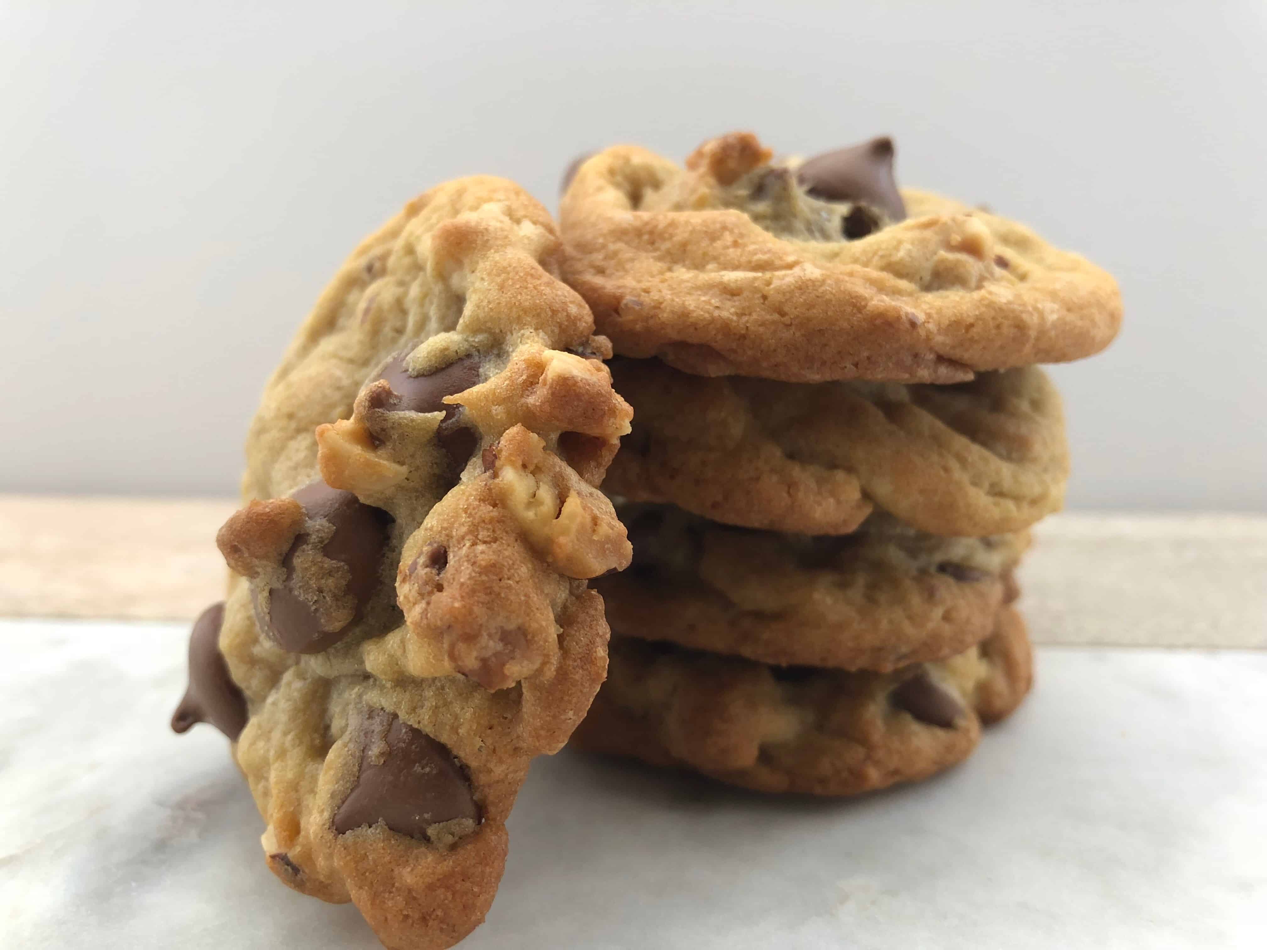 https://www.mapleandthyme.com/wp-content/uploads/2018/02/Stack-of-Toasted-Hazelnut-and-Milk-Chocolate-Cookies.jpg