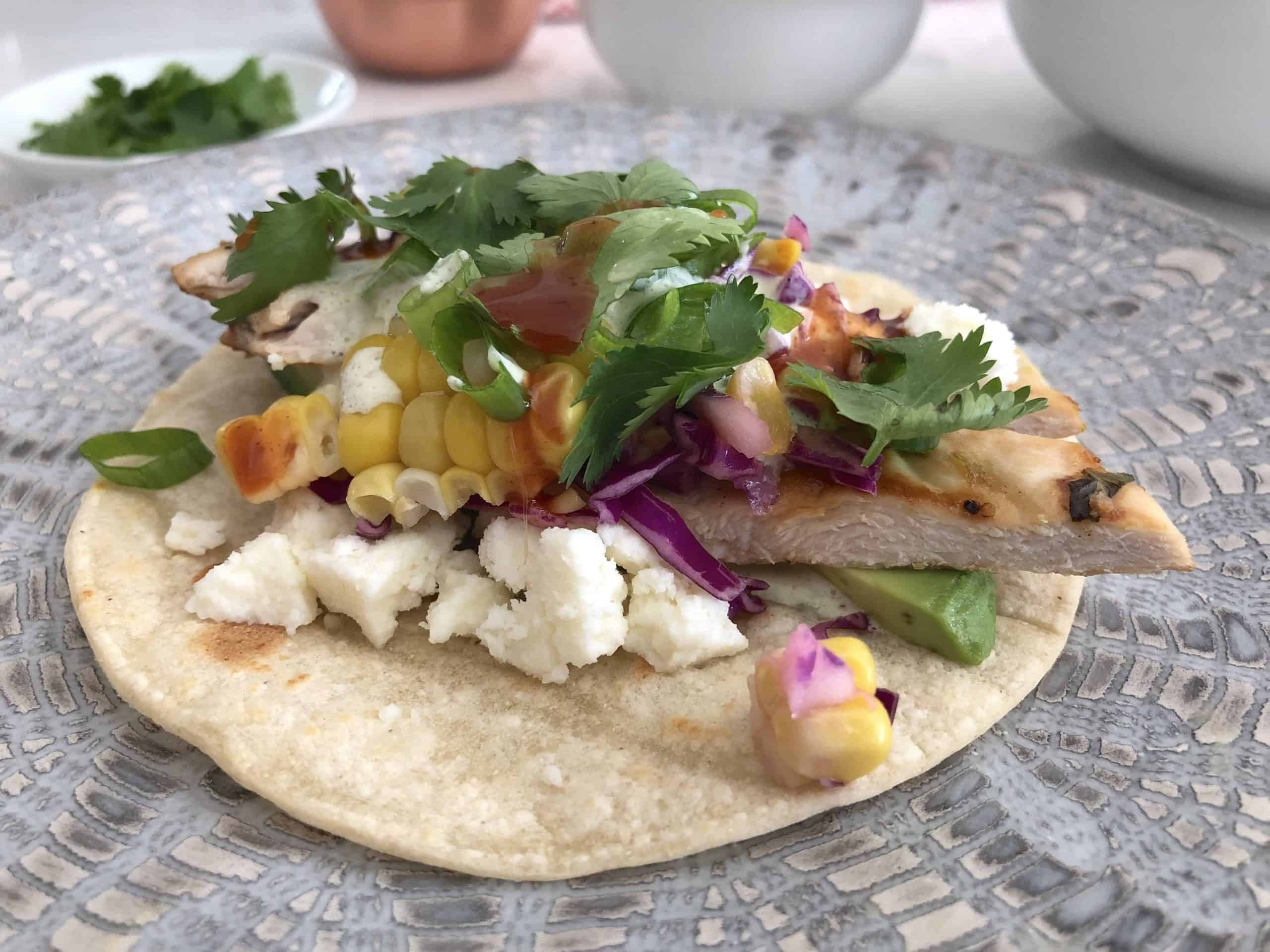 cilantro lime chicken taco on a gray plate