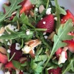 up close strawberry salad in white bowl verticalJPG