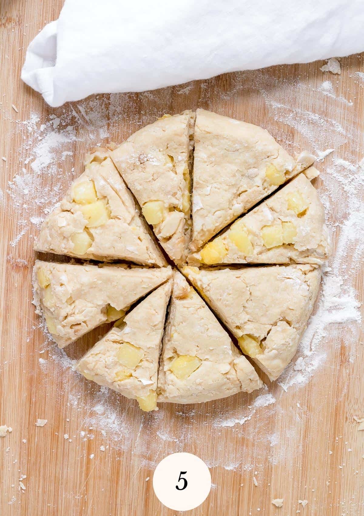 scone dough in circle and cut into wedges