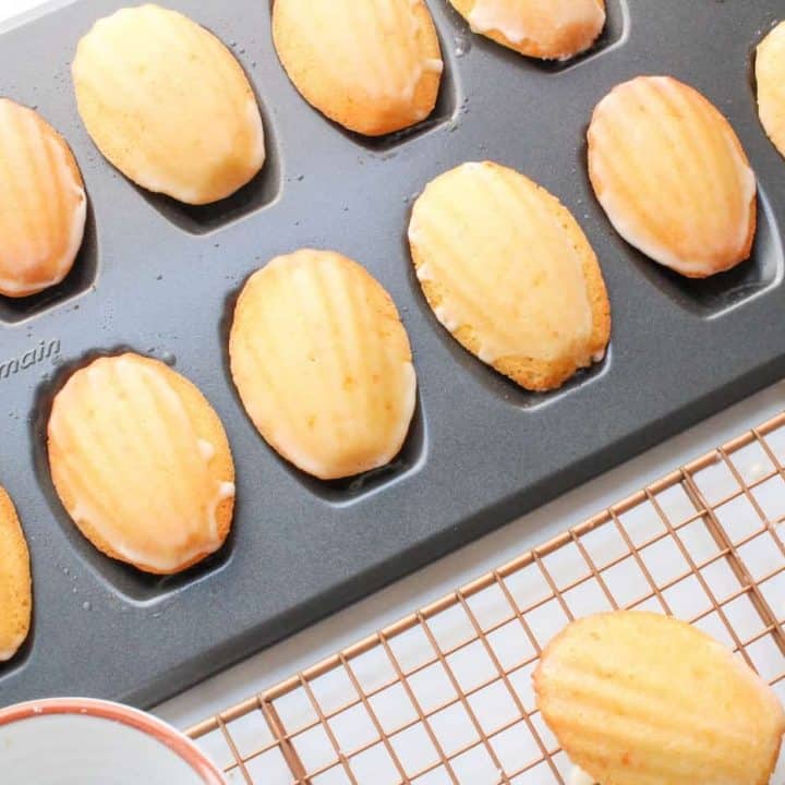 orange almond madeleines in pan