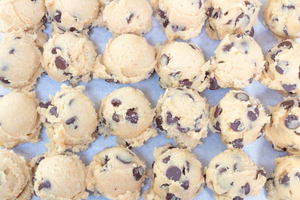 scoops of s'mores cookie dough on sheet pan.