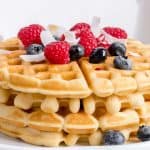 plate of gluten free waffles with berries
