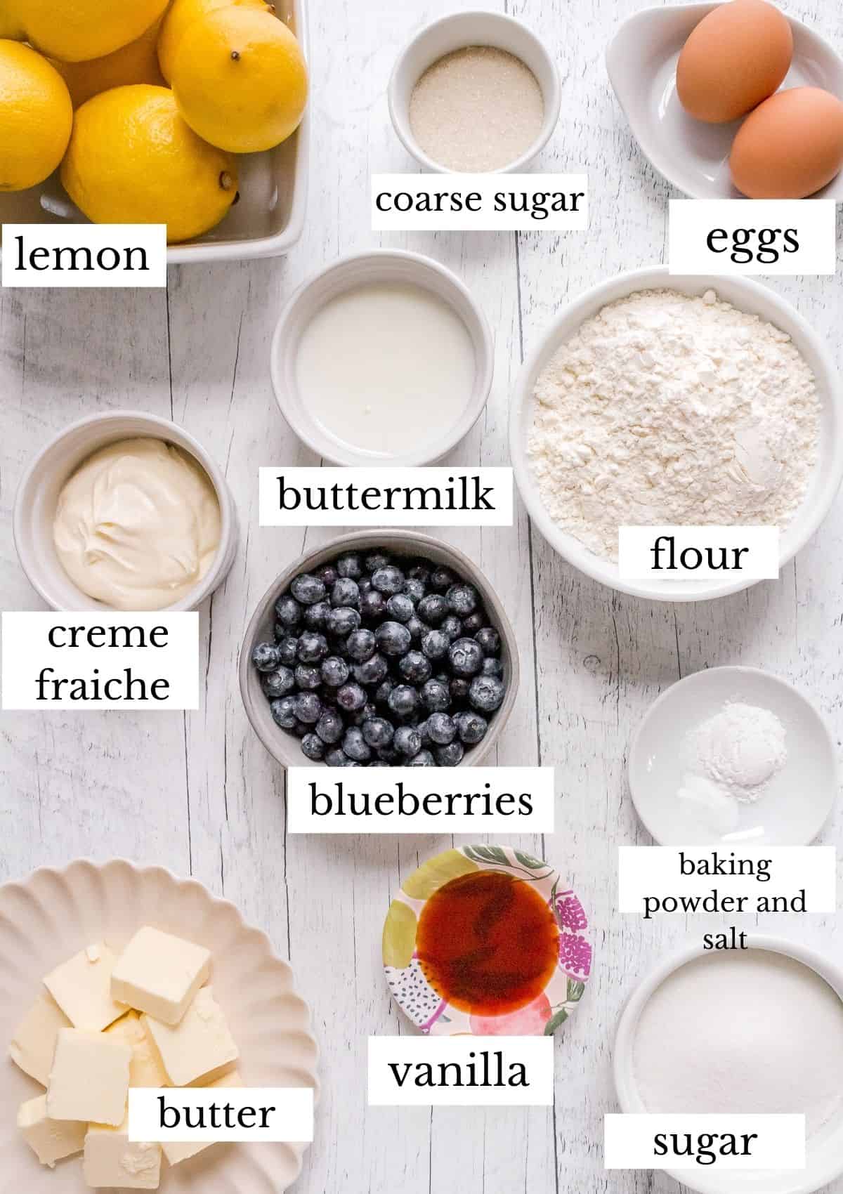 ingredients for mini blueberry muffins on white background