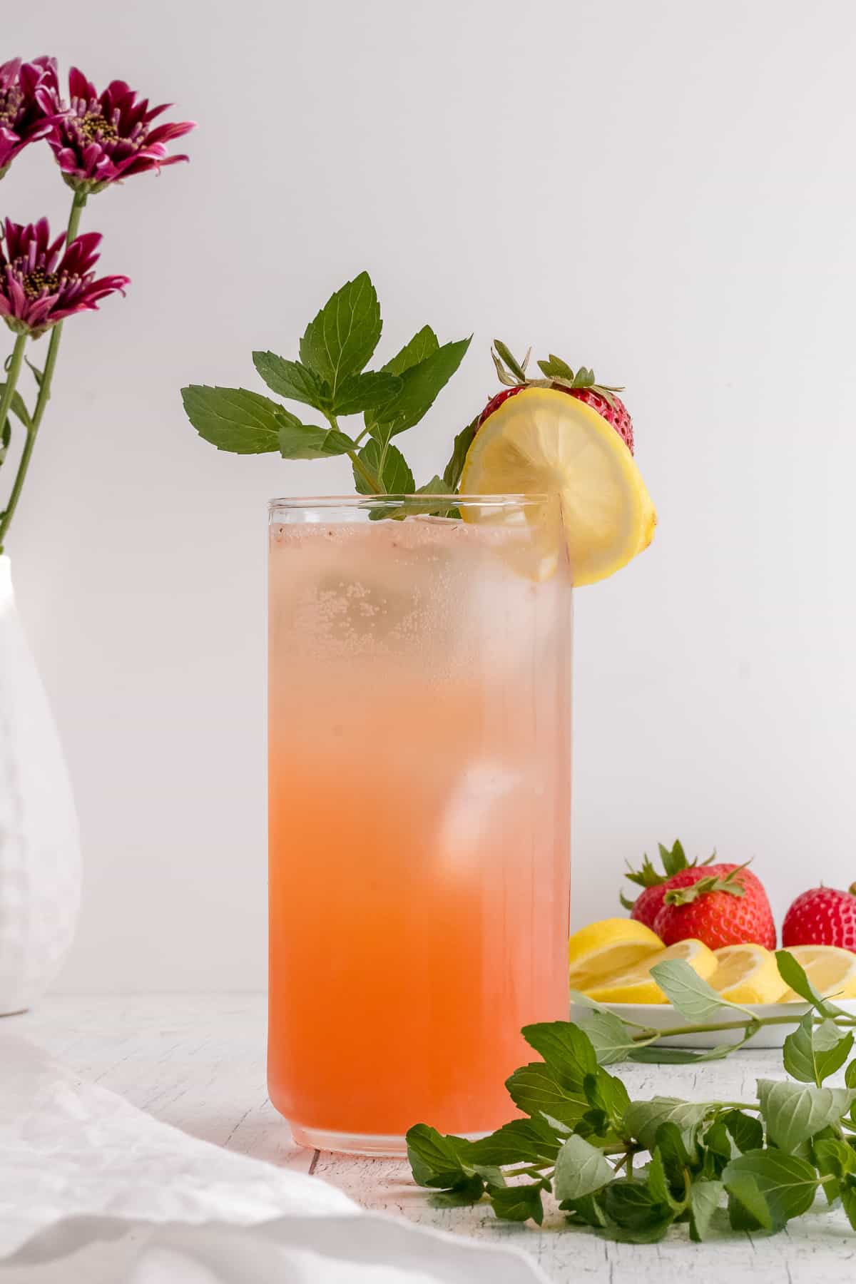 vodka strawberry lemonade with mint and flowers