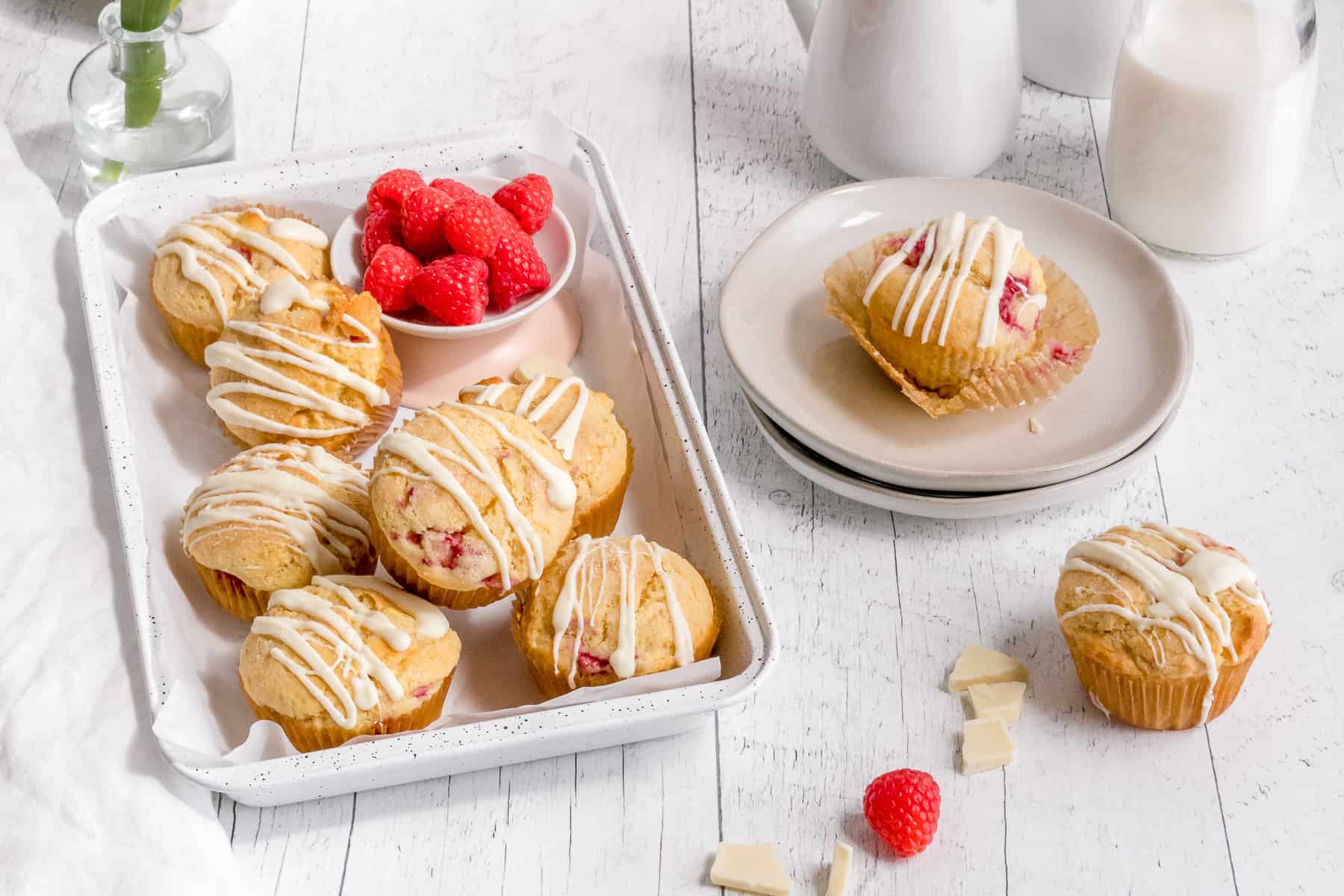 raspberry and white chocolate muffins in white pan