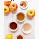 ingredients for instant pot apple butter on white barn board