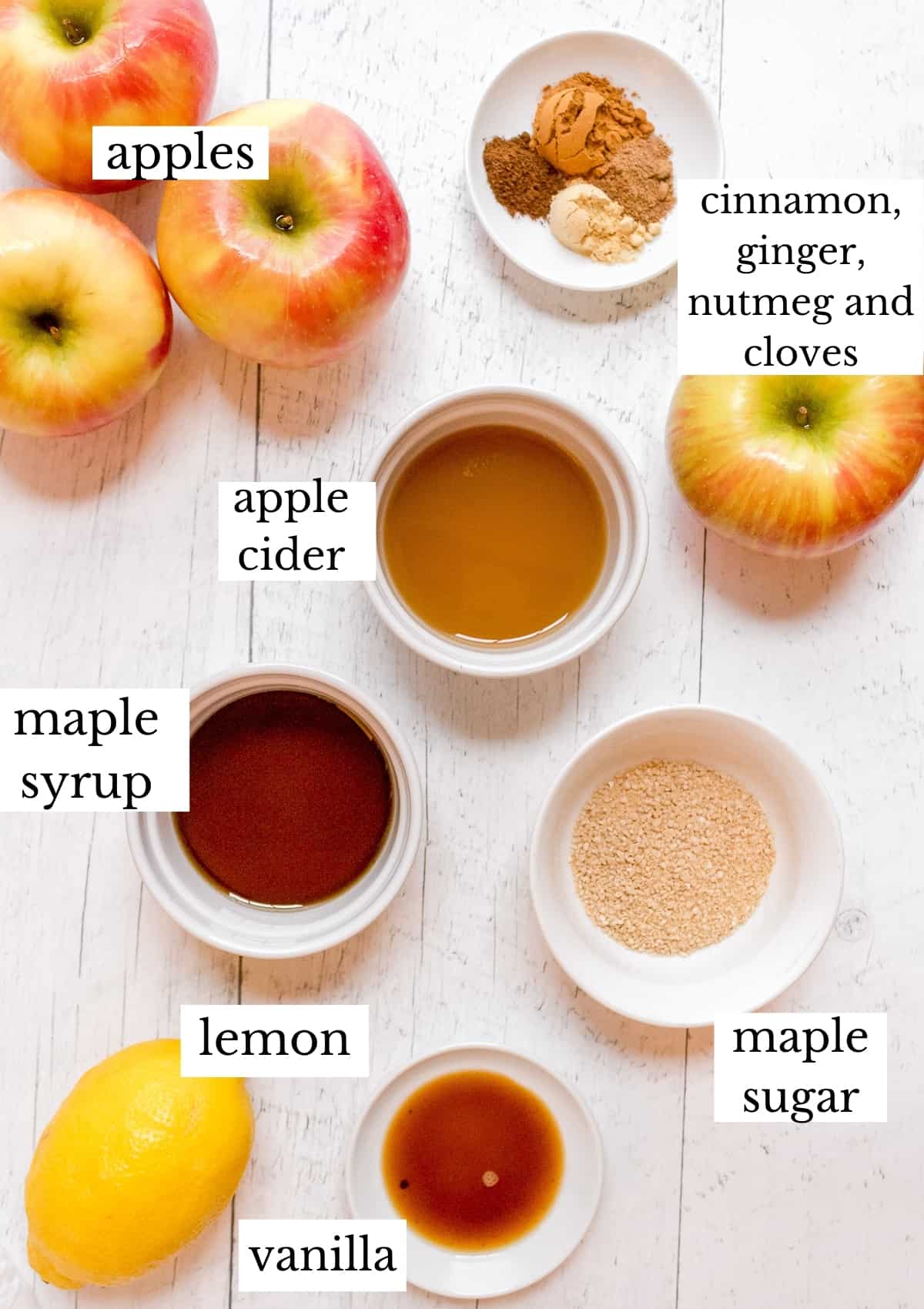 ingredients for instant pot apple butter on white wood background.