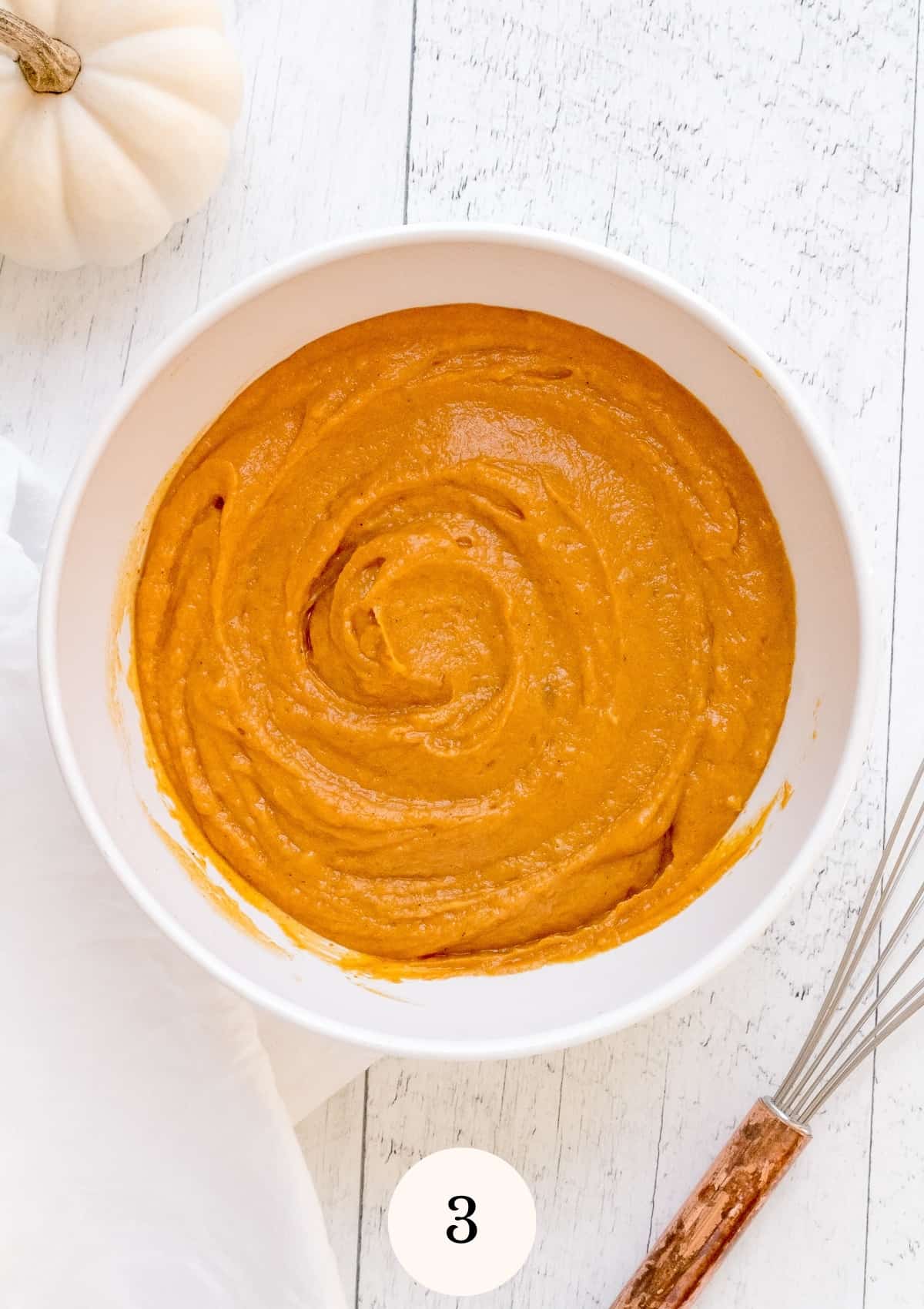 batter for pumpkin bread in mixing bowl.