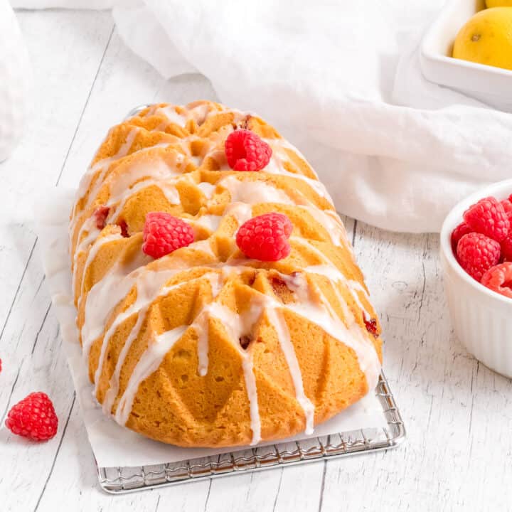 lemon raspberry loaf with berries and lemons.