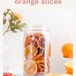 dehydrated orange slices in a large mason jar.