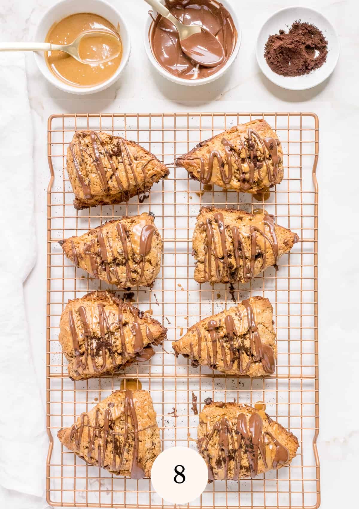 coffee scones with coffee glaze and chocolate drizzle.