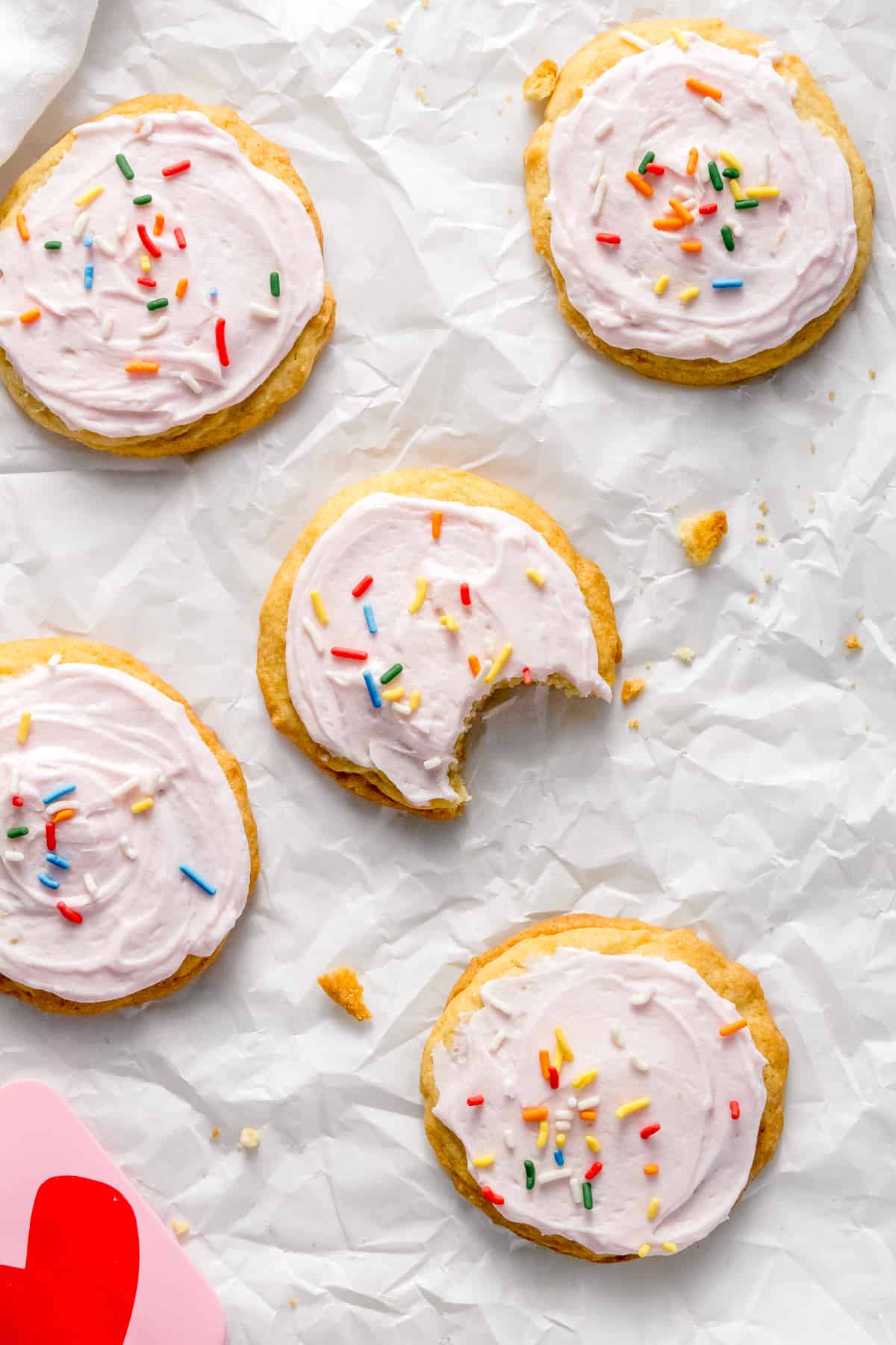 soft almond sugar cookies with buttercream and sprinkles.