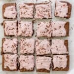 cherry chocolate brownies with cherry buttercream and shaved dark chocolate.