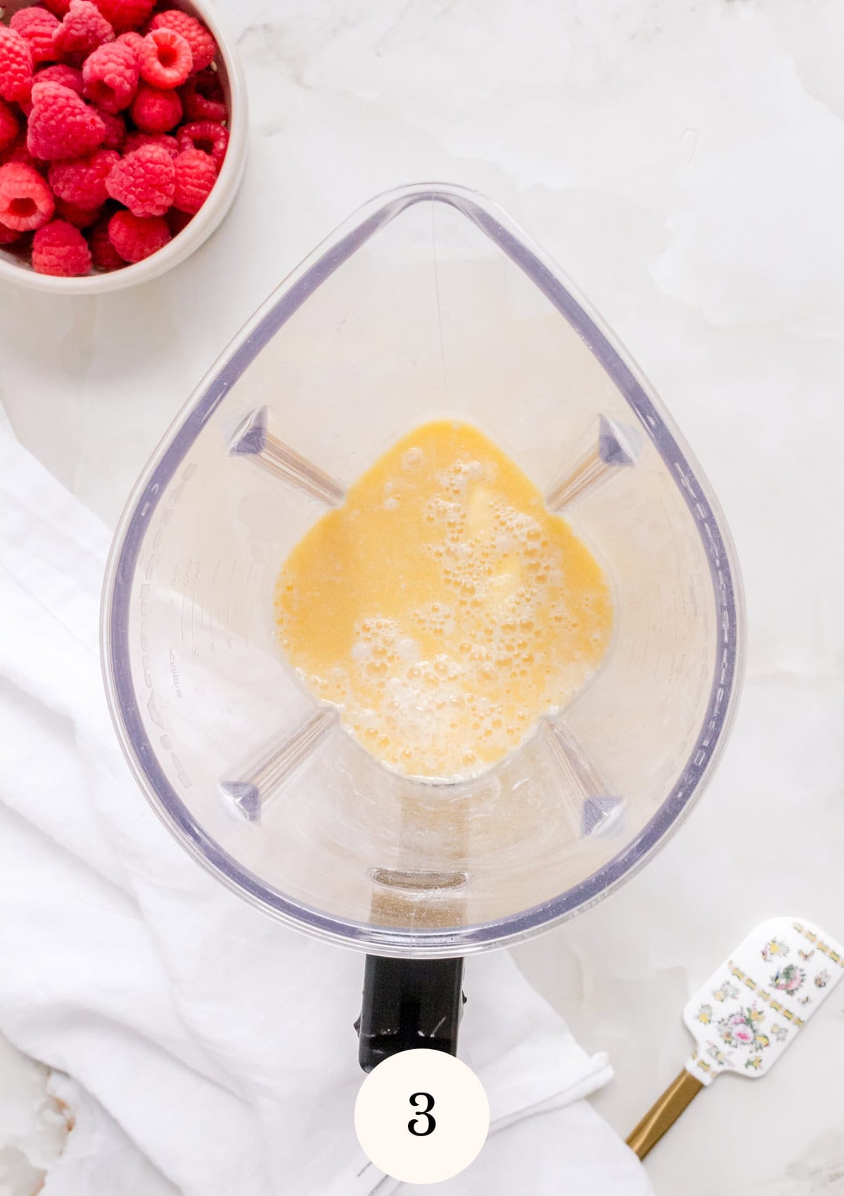 A blender containing gluten free crepe batter.