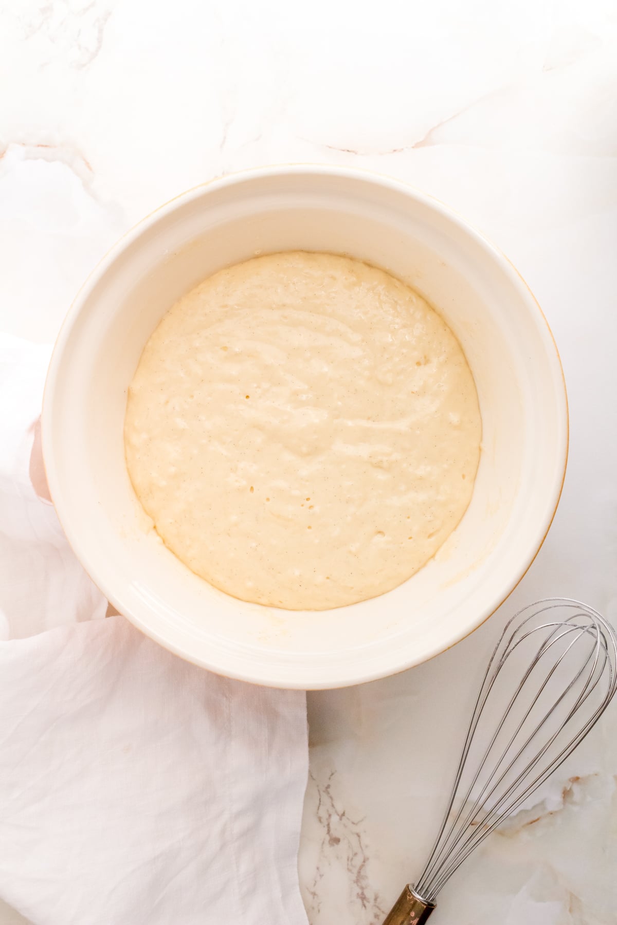 discard waffle batter in large mixing bowl with copper whisk.